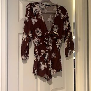 Red floral long sleeve romper